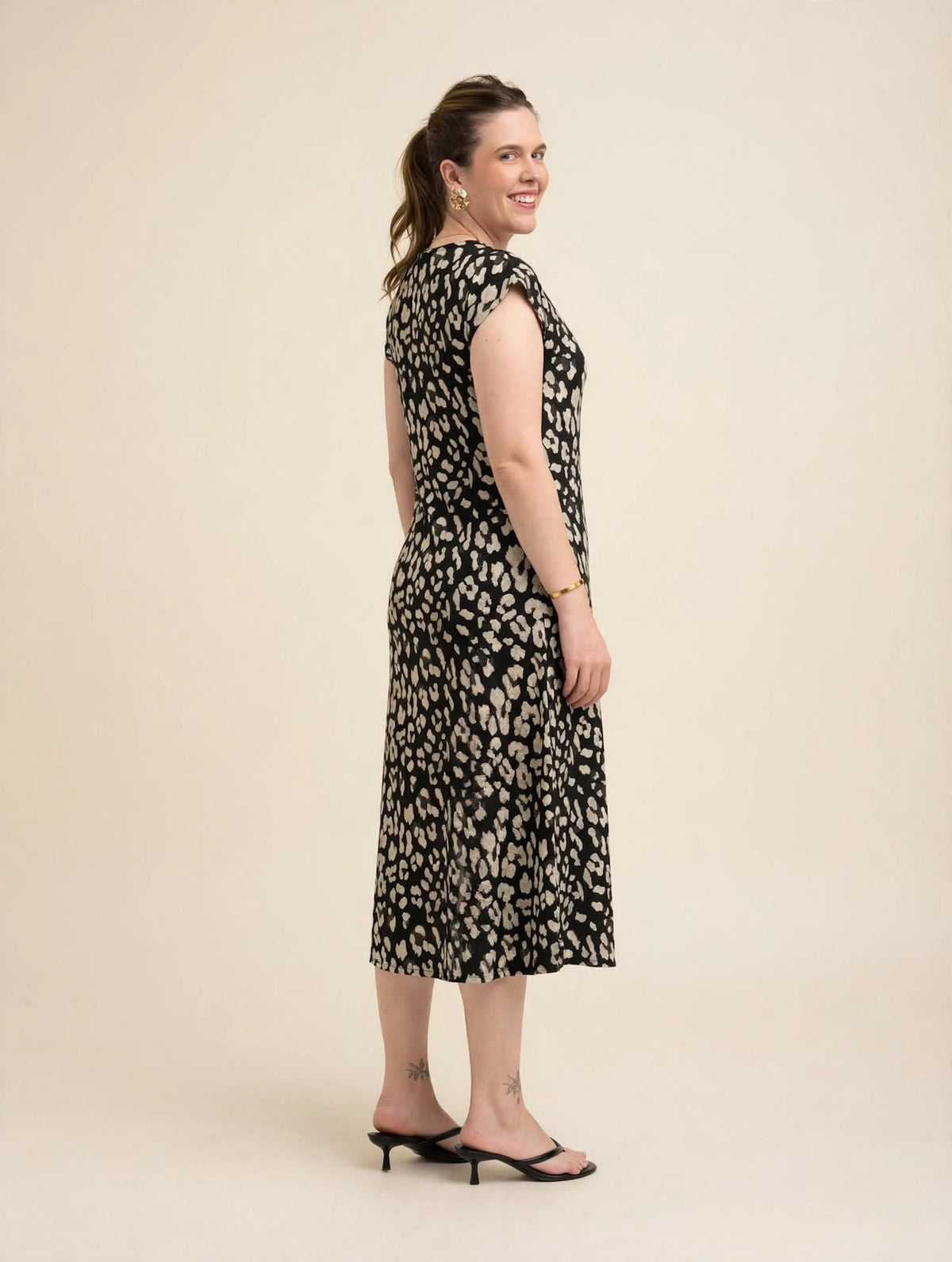 Vestido Evasê Oncinha