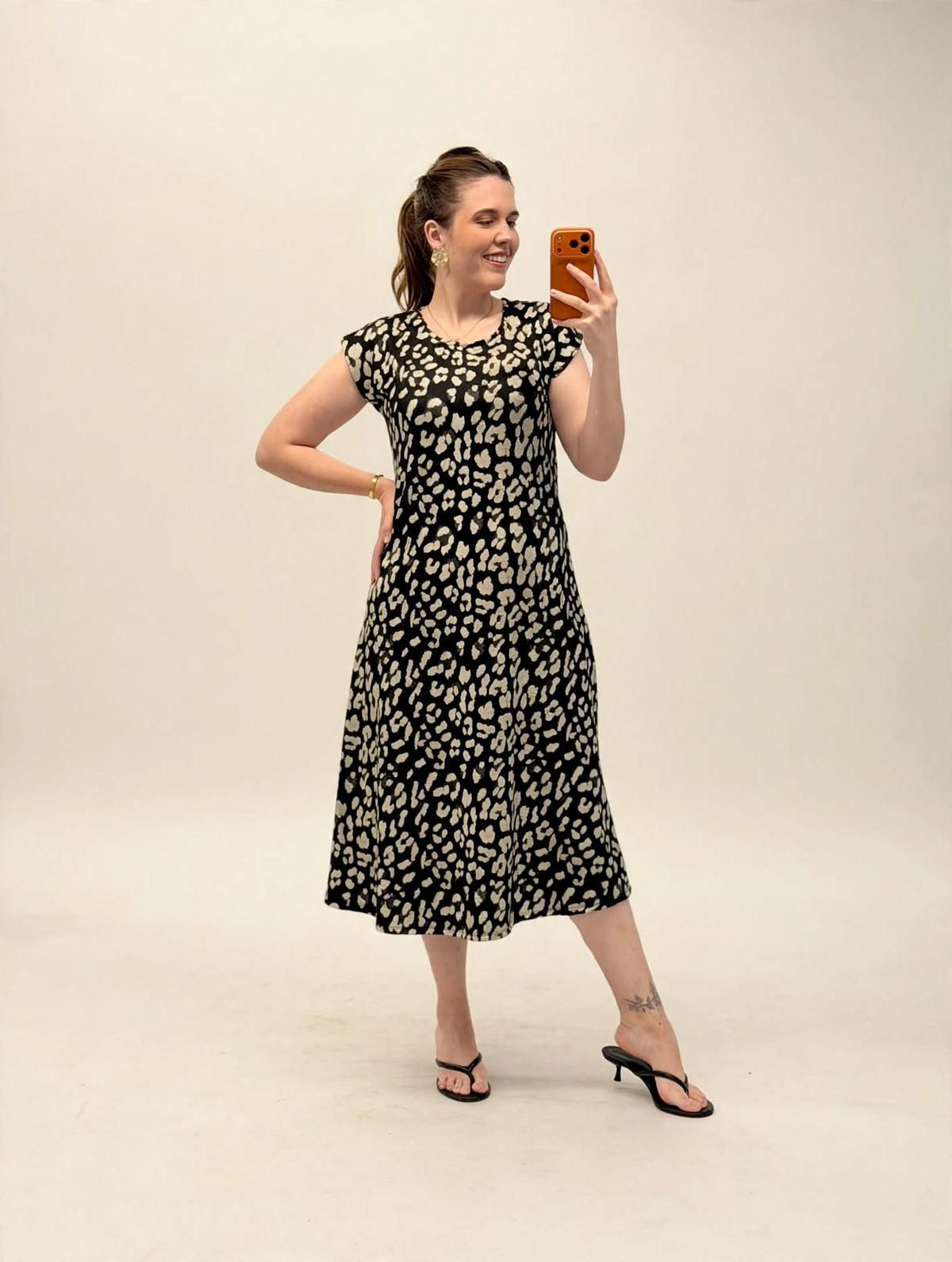 Vestido Evasê Oncinha