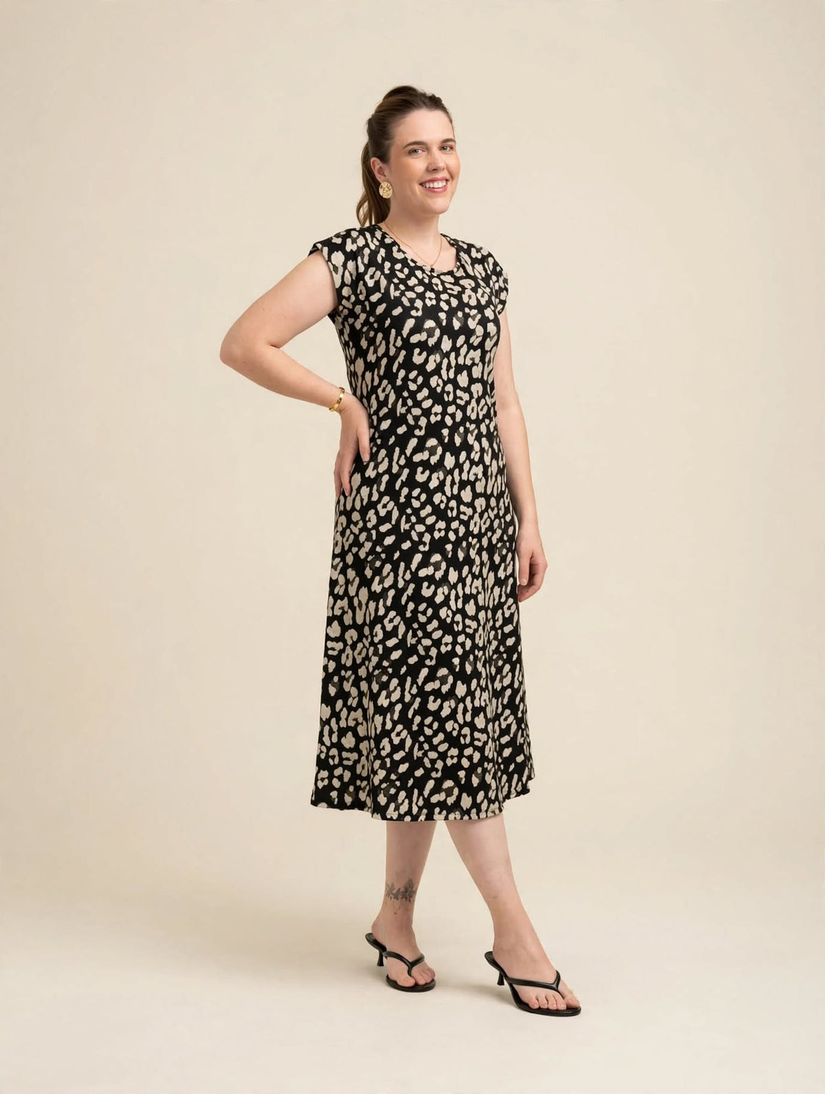 Vestido Evasê Oncinha